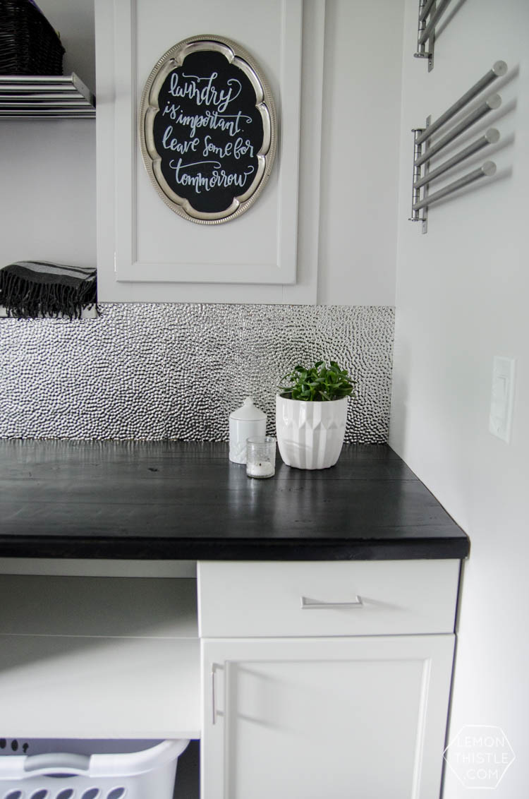 I love this laundry room makeover! I can't believe those countertops are WOOD!