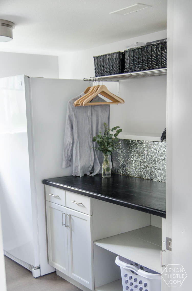 I love this laundry room makeover! I can't believe those countertops are WOOD!