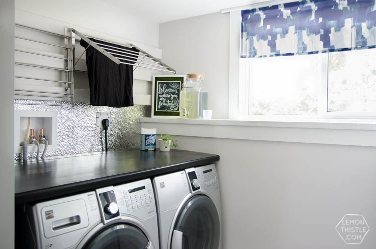 I love this laundry room makeover! I can't believe those countertops are WOOD!