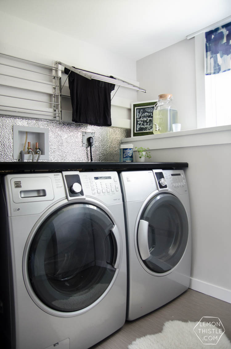 I love this laundry room makeover! I can't believe those countertops are WOOD!