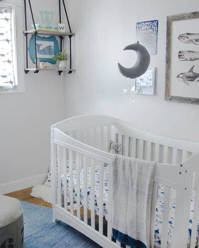 I love this updated take on a whale themed nursery with greys and blues... it could totally grow with them!