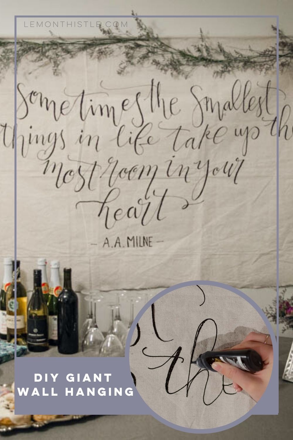 DIY Giant Wall Hanging using a drop cloth- image of wall hanging at baby shower, text over reads DIY giant wall hanging, image overlay shows lettering with paint squeeze bottle on material