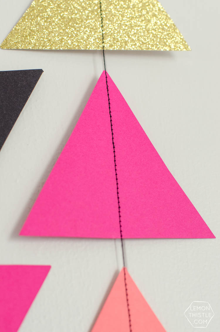 How to DIY a giant triangle garland... it's THAT garland! Finally, instructions I can manage- and I like the options to space out the triangles.