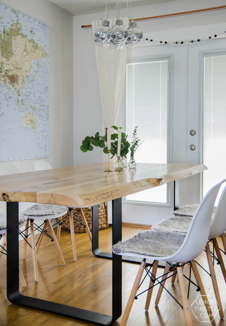 DIY Live Edge Wood Dining Room Table with Steel Legs... uhhhhm love this! So modern but rustic