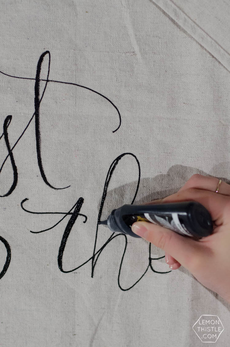 how to faux brush lettering on surfaces using a squeeze bottle with fine tip for paint