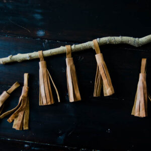 Simple DIY Leather Tassels (a video)... I never thought to get leather like this! Brilliant!