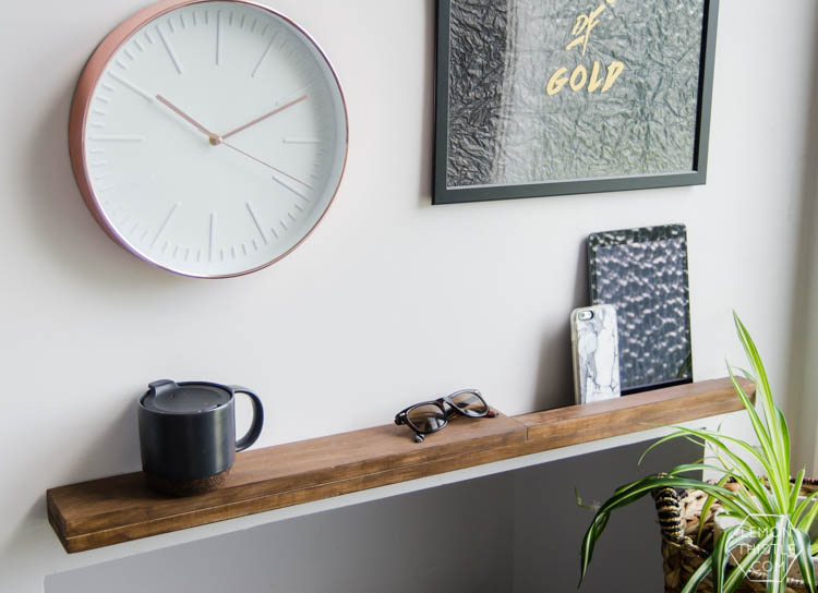 I LOVE this DIY modern wood shelf for an entry way. It's totally minimal but really functional with that ledge. 