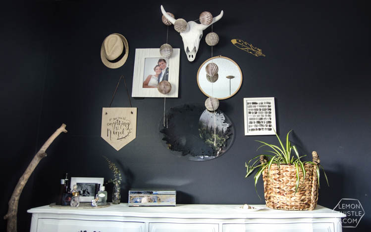 I LOVE this moody navy bedroom- the forrest, the gallery wall- the brass lights... it's all so good! And I love all the DIY