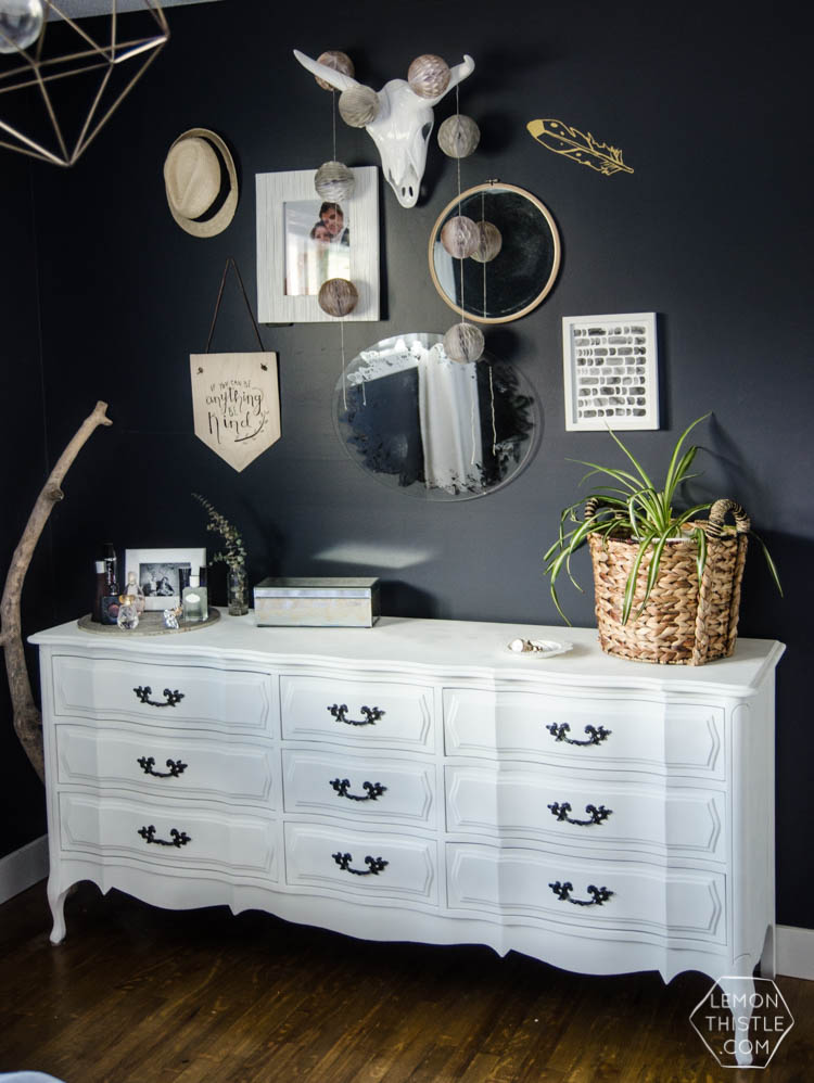 I LOVE this moody navy bedroom- the forrest, the gallery wall- the brass lights... it's all so good! And I love all the DIY
