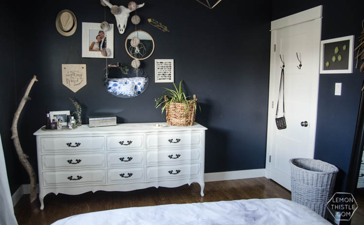 I LOVE this moody navy bedroom- the forrest, the gallery wall- the brass lights... it's all so good! And I love all the DIY