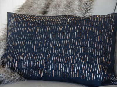 DIY No Sew Metallic Foil Throw Pillow- this is so shiny good! I can't believe it's washable.