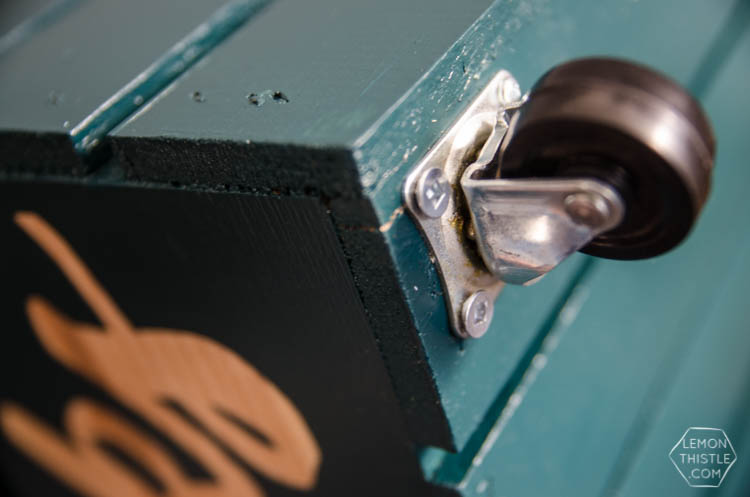 DIY rolling book crate- I love that stencilled label! The natural wood looks so great
