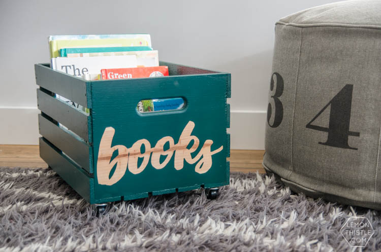 DIY rolling book crate- I love that stencilled label! The natural wood looks so great