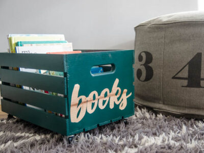 DIY rolling book crate- I love that stencilled label! The natural wood looks so great