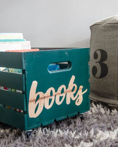 DIY rolling book crate- I love that stencilled label! The natural wood looks so great