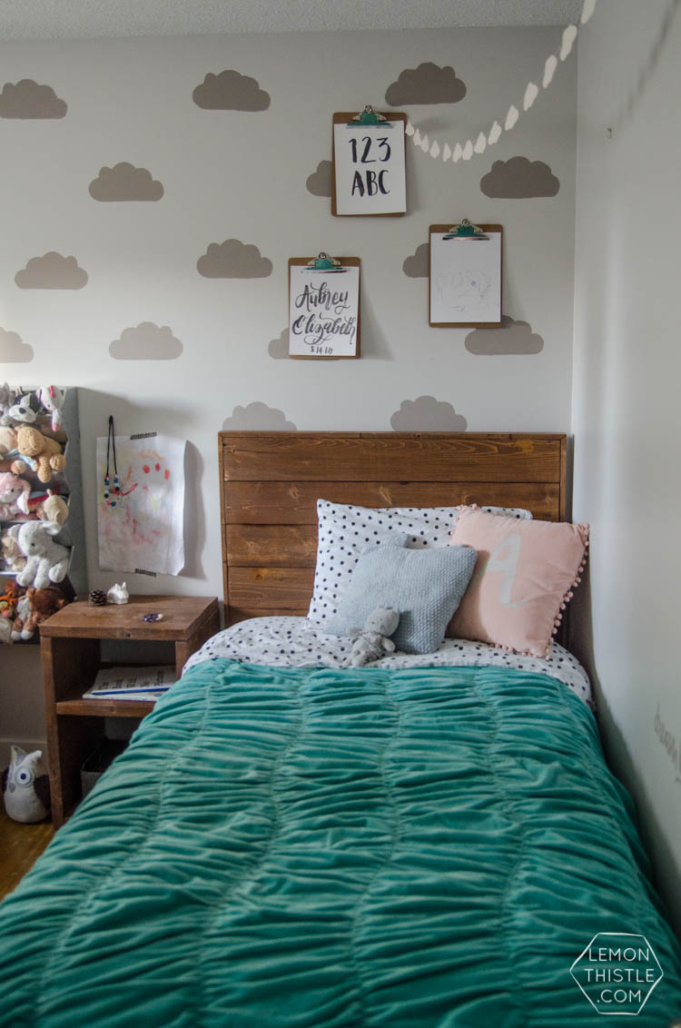 DIY painted wall stencils 2 ways. I LOVE that cloud accent wall! So fun for a shared kids room