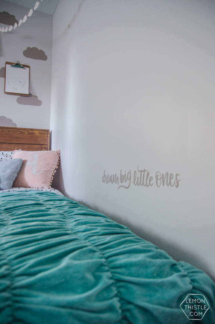 DIY painted wall stencils 2 ways. I LOVE that cloud accent wall! So fun for a shared kids room