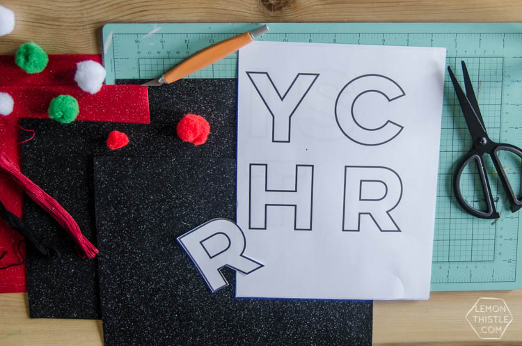 I love this DIY Christmas garland! The modern felt letters are perfect- and the pom pom is a cute detail!