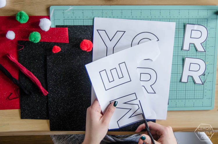I love this DIY Christmas garland! The modern felt letters are perfect- and the pom pom is a cute detail!