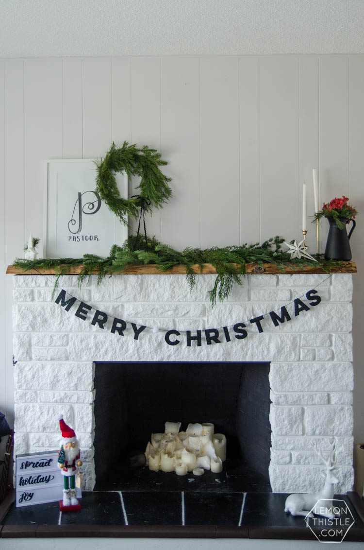 I love this DIY Christmas garland! The modern felt letters are perfect- and the pom pom is a cute detail!