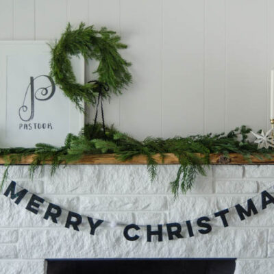 I love this DIY Christmas garland! The modern felt letters are perfect- and the pom pom is a cute detail!