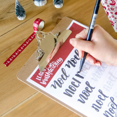 Free Printable Noel Holiday Brush Lettering worksheet- what a great idea to practice handlettering this way!