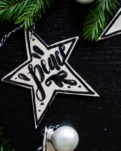 These DIY wooden star ornaments add some monochromatic charm to your Christmas tree and are done with NO power tools in less than 10 minutes.