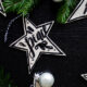 These DIY wooden star ornaments add some monochromatic charm to your Christmas tree and are done with NO power tools in less than 10 minutes.