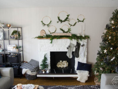 Canadian Christmas Home Tour- I love the black, white and fresh greenery in this holiday style!