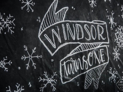 What a clever idea! Using a dropcloth to create a DIY giant chalkboard backdrop for birthday party decorations! Perfect for this modern winter wonderland!