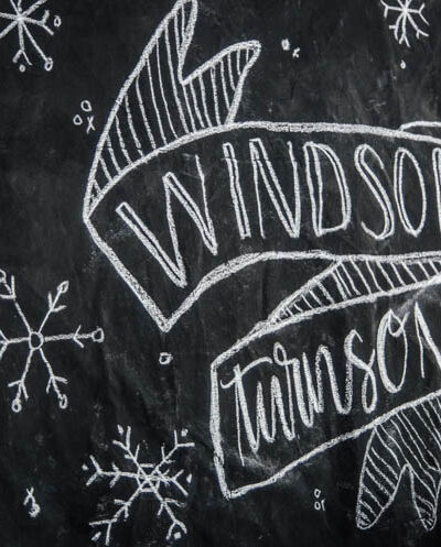 What a clever idea! Using a dropcloth to create a DIY giant chalkboard backdrop for birthday party decorations! Perfect for this modern winter wonderland!