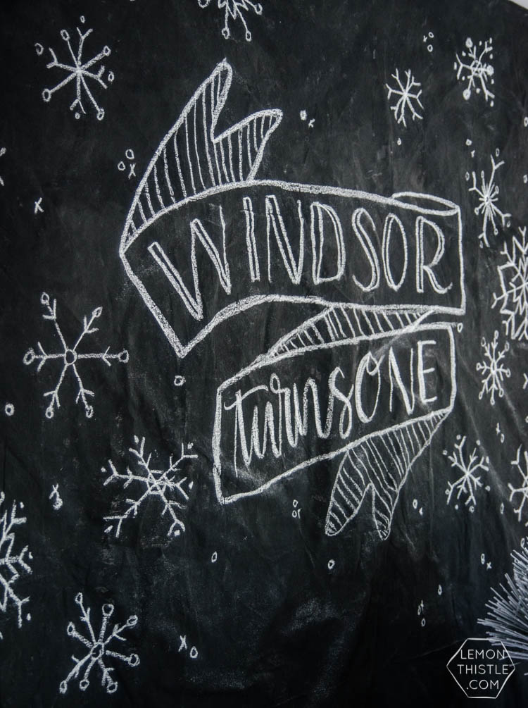 What a clever idea! Using a dropcloth to create a DIY giant chalkboard backdrop for birthday party decorations! Perfect for this modern winter wonderland!