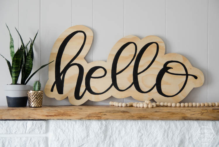 DIY plywood cutout hello sign... I LOVE this! And the video makes it look so simple
