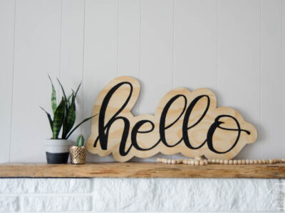 DIY plywood cutout hello sign... I LOVE this! And the video makes it look so simple