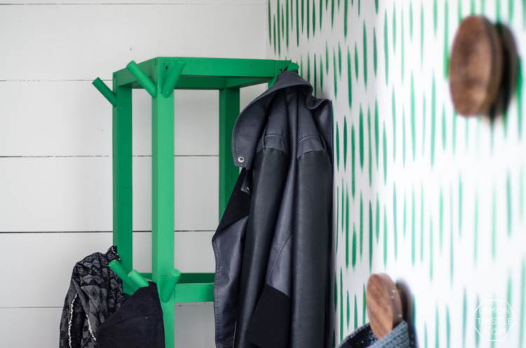 Simple Wooden DIY Coat Rack- love the bright green of this one! So great for a small space.