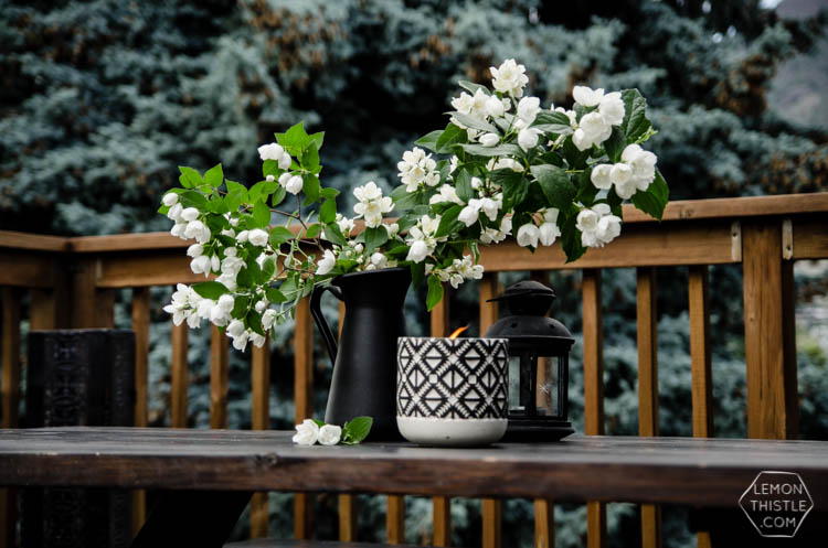 I love the wood look deck and this seating area is so sweet!