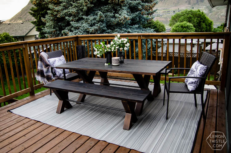Deck reveal! I love the look of a wooden deck and the practical furniture here is awesome