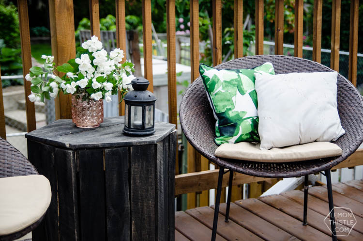 I love the wood look deck and this seating area is so sweet!