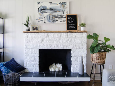 DIY Fireplace Refresh with painted stone & live edge mantle- great tips on how to!
