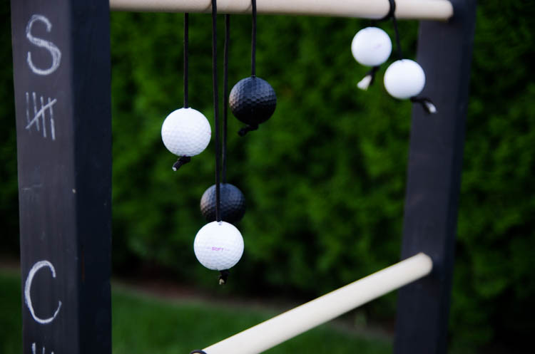 DIY Wooden Ladder Ball- Love the black and white look! Plus- chalkboard for score keeping