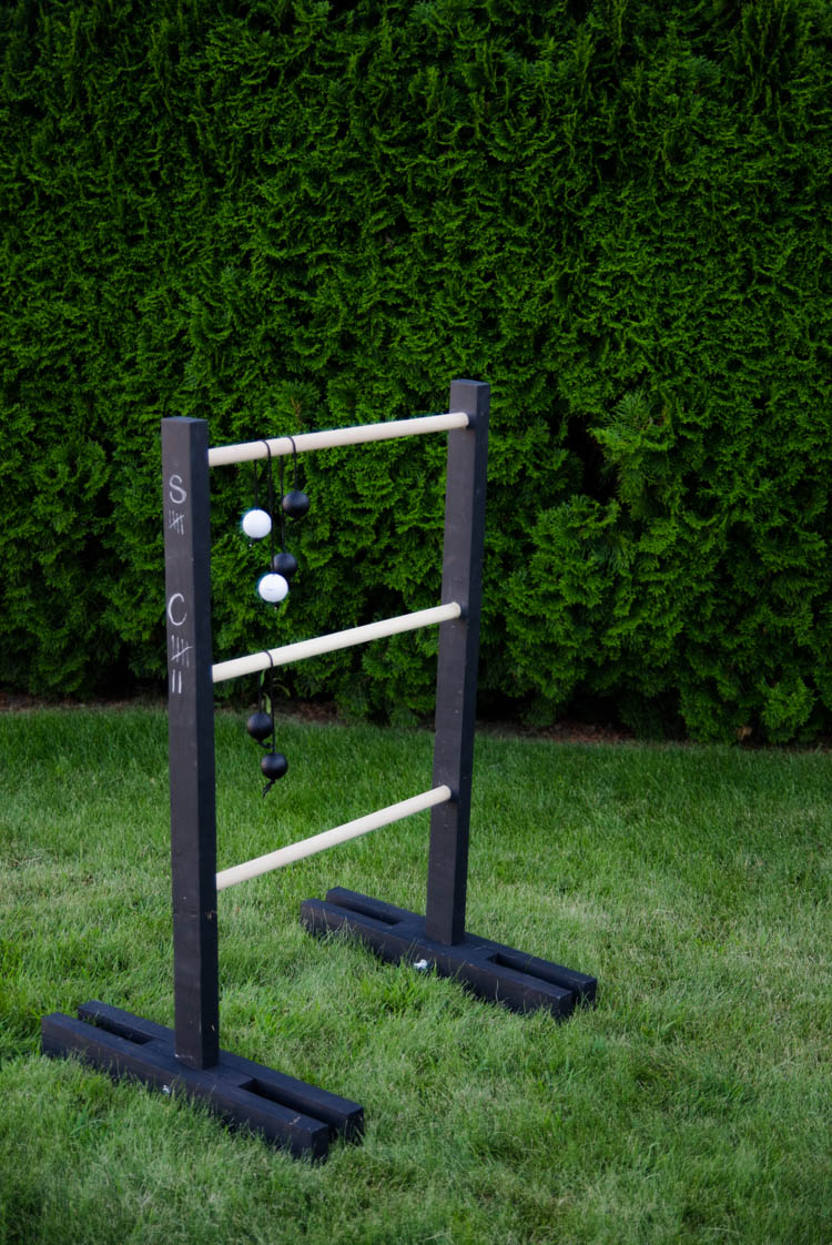 DIY Wooden Ladder Ball- Love the black and white look! Plus- chalkboard for score keeping