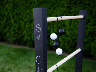 DIY Wooden Ladder Ball- Love the black and white look! Plus- chalkboard for score keeping