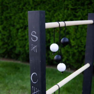 DIY Wooden Ladder Ball- Love the black and white look! Plus- chalkboard for score keeping