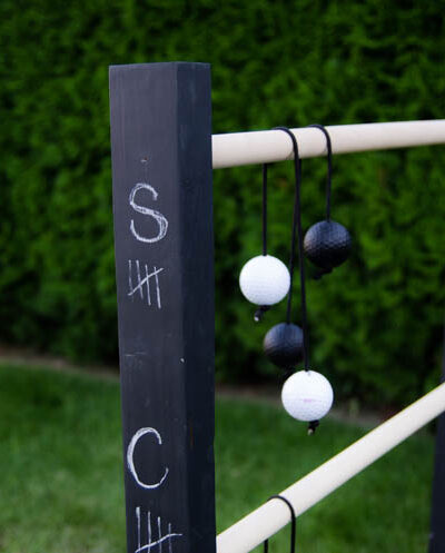 DIY Wooden Ladder Ball- Love the black and white look! Plus- chalkboard for score keeping