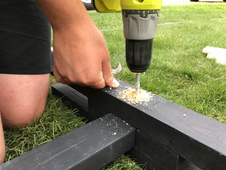 DIY Wooden Ladder Ball- Love the black and white look! Plus- chalkboard for score keeping