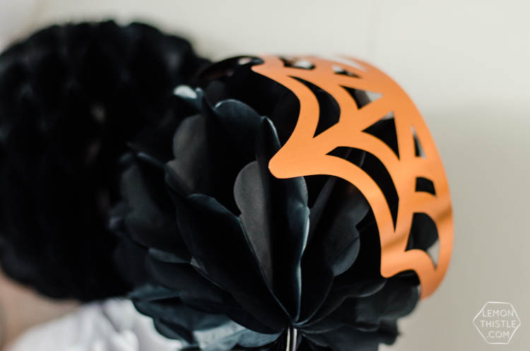 Giant DIY Halloween Party Garland with tissue honeycomb balls and party foil