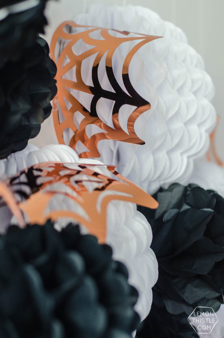 Giant DIY Halloween Party Garland with tissue honeycomb balls and party foil