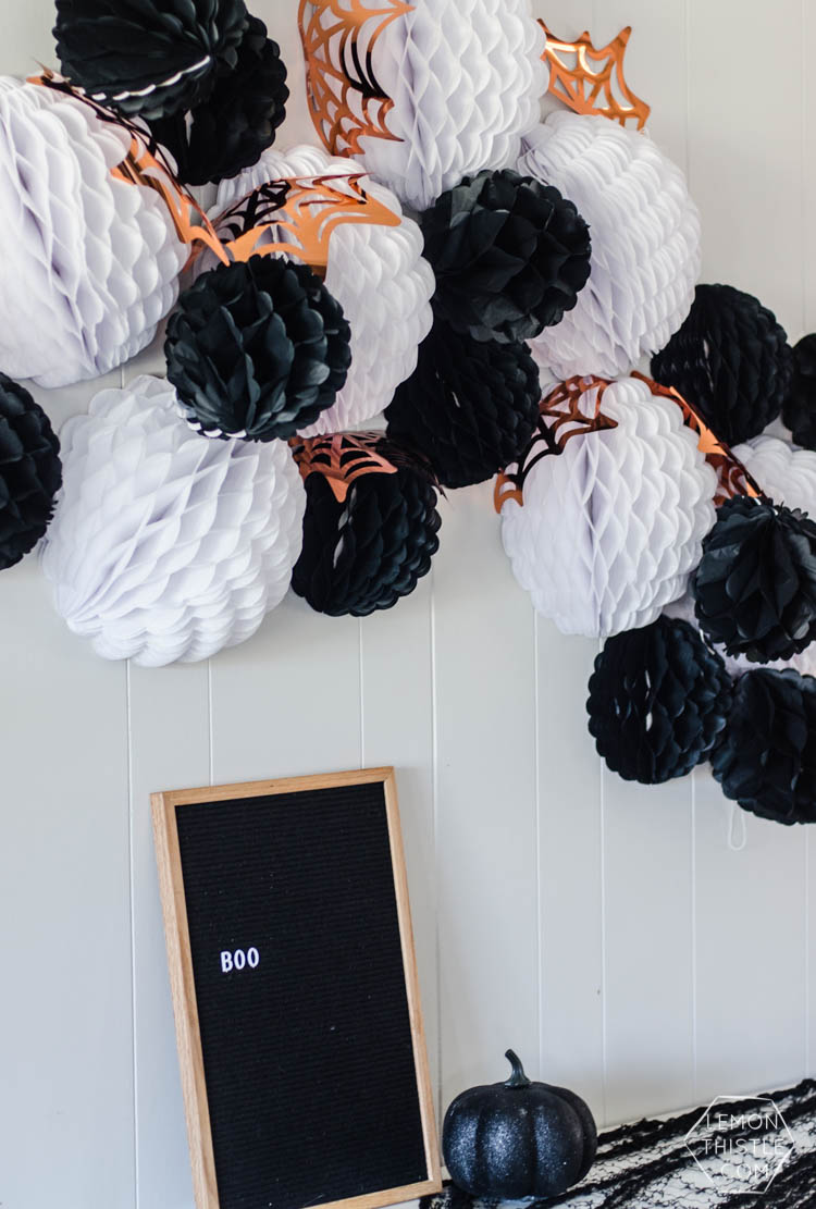 Giant DIY Halloween Party Garland with tissue honeycomb balls and party foil