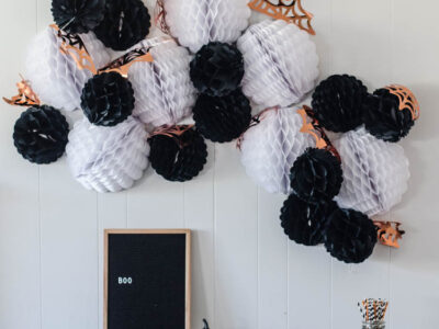 Giant DIY Halloween Party Garland with tissue honeycomb balls and party foil