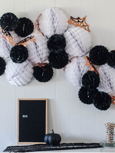 Giant DIY Halloween Party Garland with tissue honeycomb balls and party foil